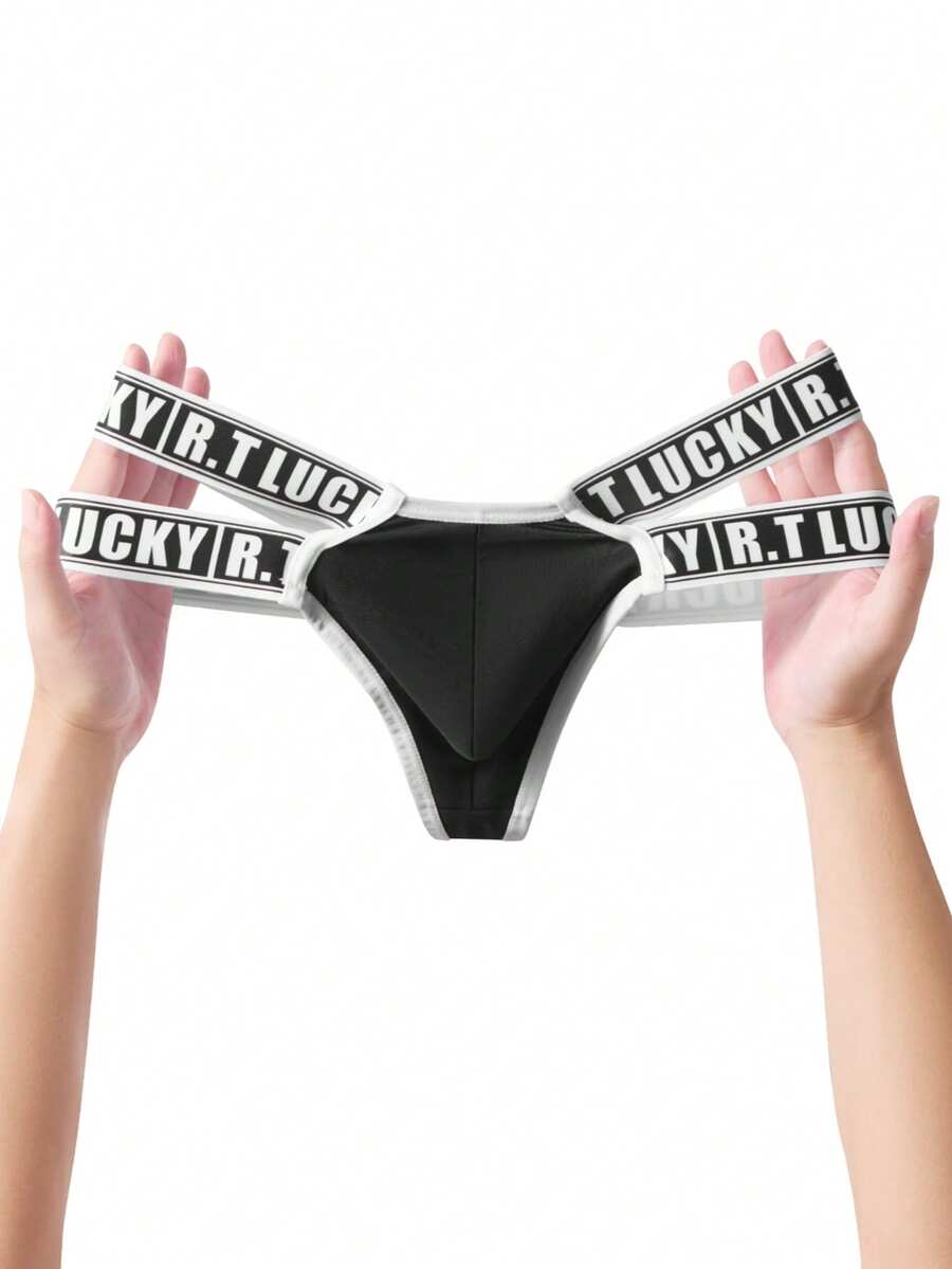 Black low-rise men's thong underwear featuring a belted waist detail and letter pattern on knitted fabric.