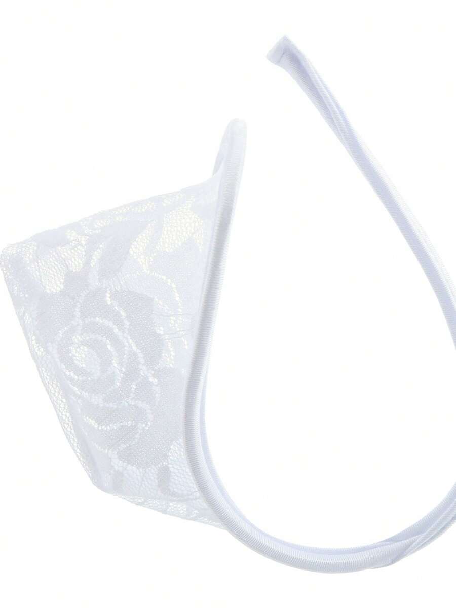 Men's low rise C-string thong briefs made from knitted fabric featuring contrast lace details.