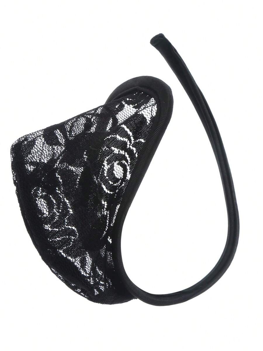 Men's low rise C-string thong briefs made from knitted fabric featuring contrast lace details.