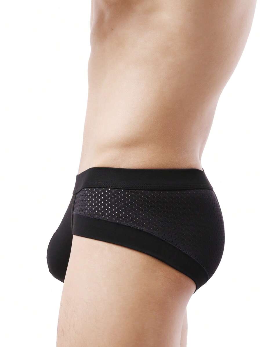 White plain men's U-convex thong underwear featuring low rise cut-out design in breathable stretch fabric.