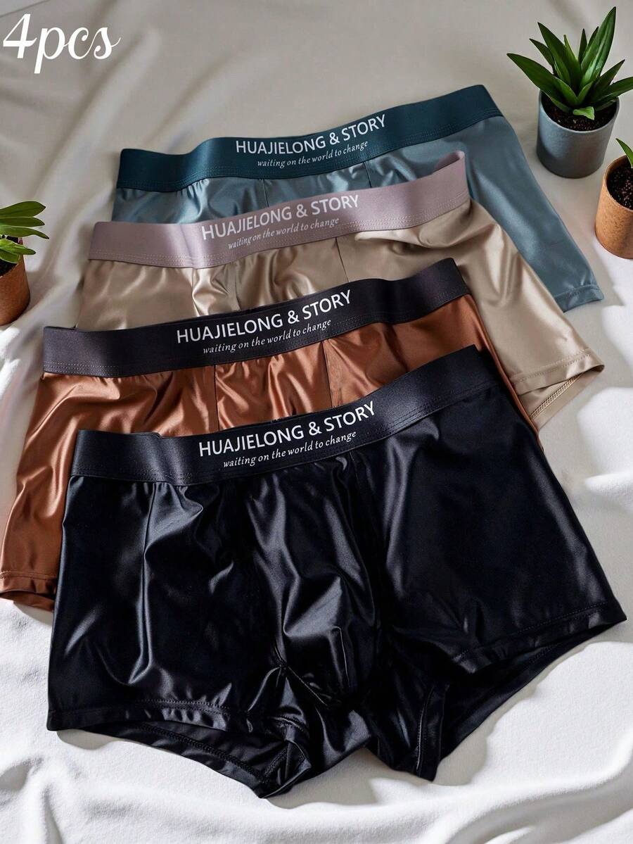 A 4-piece set of men's multicolor silk-like mid rise trunks crafted from soft knitted fabric with slight stretch and inner lining.