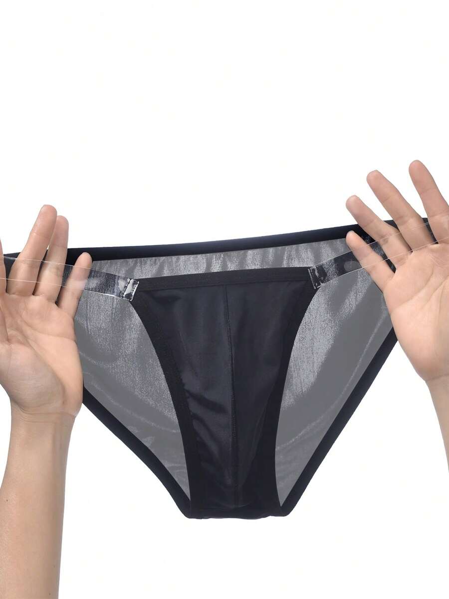 Black men's ice silk swimwear briefs featuring a low rise cut, semi-sheer fabric, and U-convex pouch design.