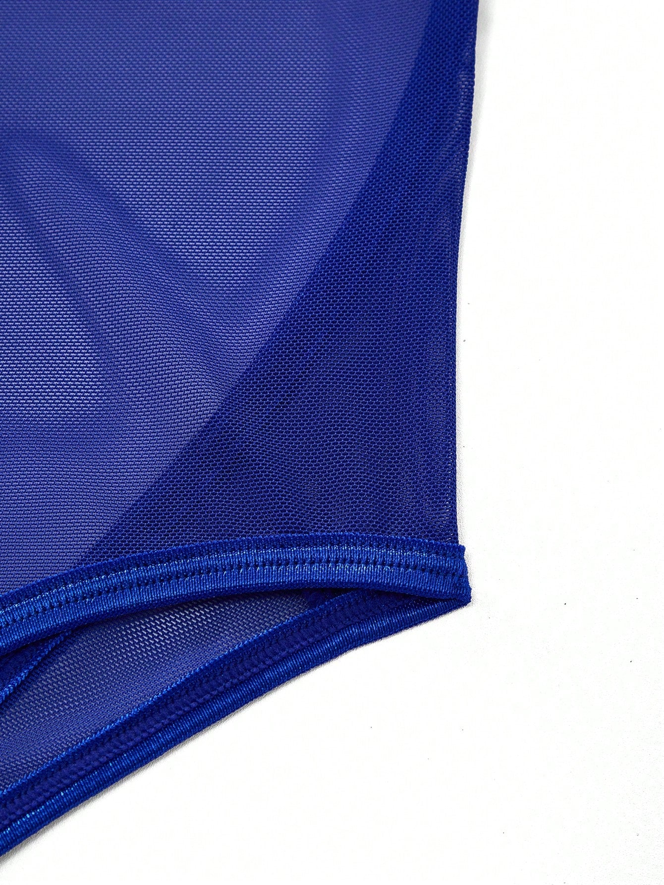 Men's mesh backless bodysuit lingerie with scoop neck, low rise fit, thong back, and suspender style for intimate occasions.