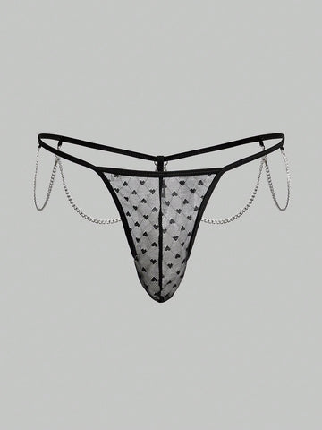 Men's black sheer mesh thong underwear with geometric pattern, low rise fit, hollow out detail, and ring accent.