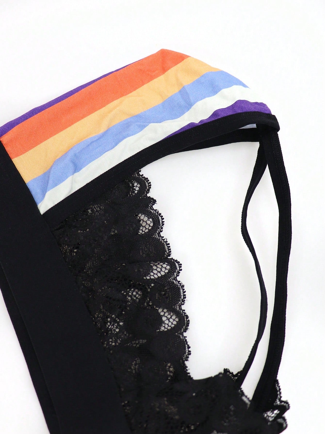 Men's rainbow print jockstrap underwear with graphic letter pattern, low-rise fit, backless design, and knitted polyamide elastane fabric.