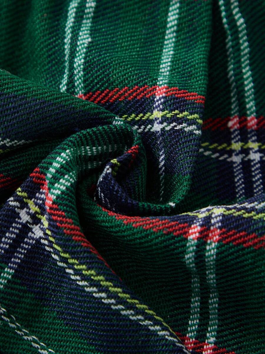 Men's low rise plaid Christmas thong in multicolor red designed for holiday roleplay and couples.