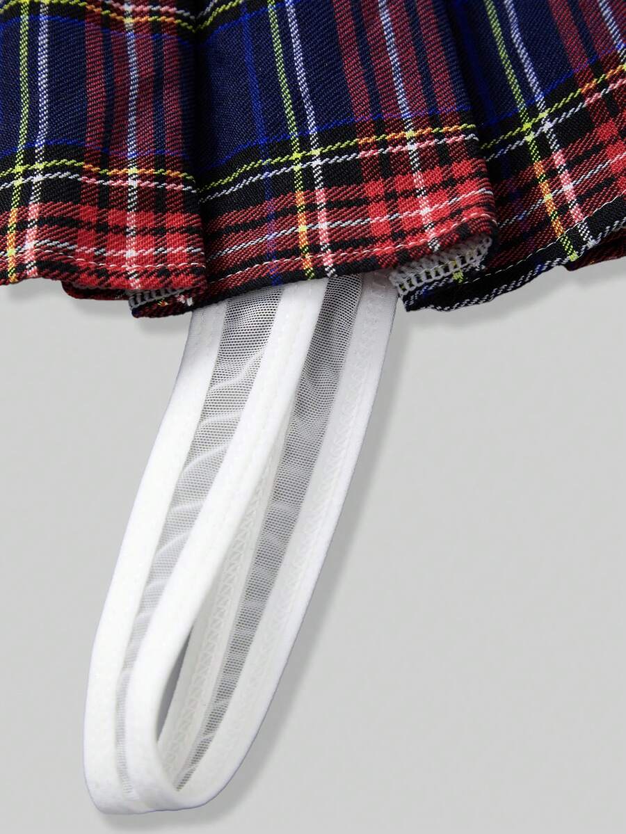 Men's low rise plaid Christmas thong in multicolor red designed for holiday roleplay and couples.