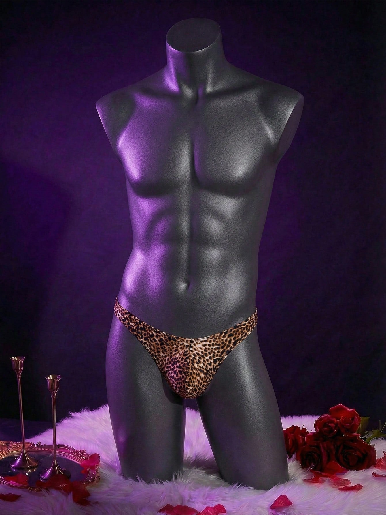 Brown men's low-rise thong underwear with leopard print in knitted fabric, made from polyester and elastane with medium stretch.