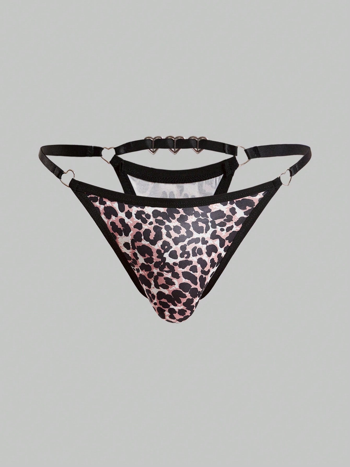 Men's sheer low-rise thong underwear in knitted fabric with rhinestone heart decor, ring detail, and medium-stretch fit.