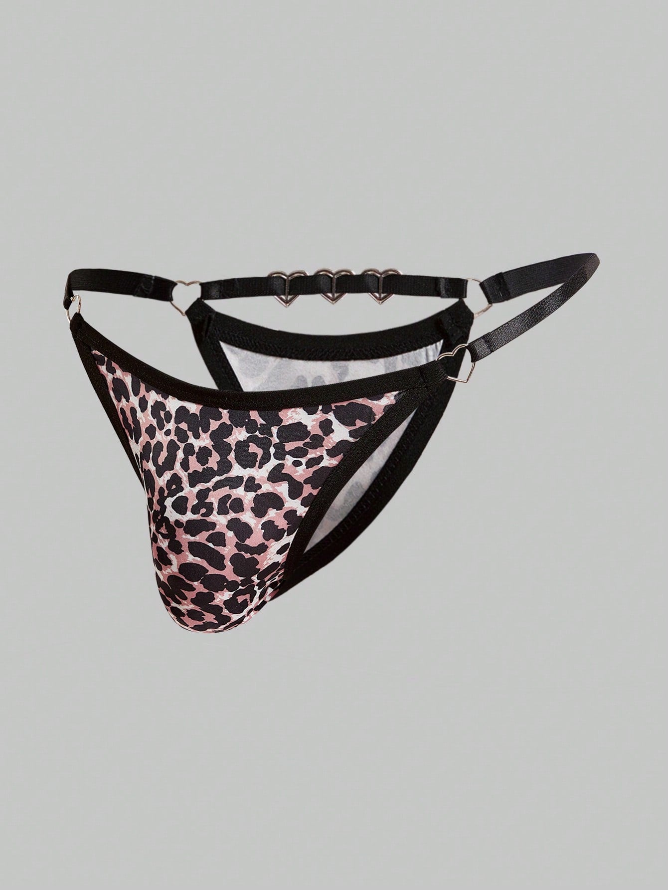 Men's sheer low-rise thong underwear in knitted fabric with rhinestone heart decor, ring detail, and medium-stretch fit.