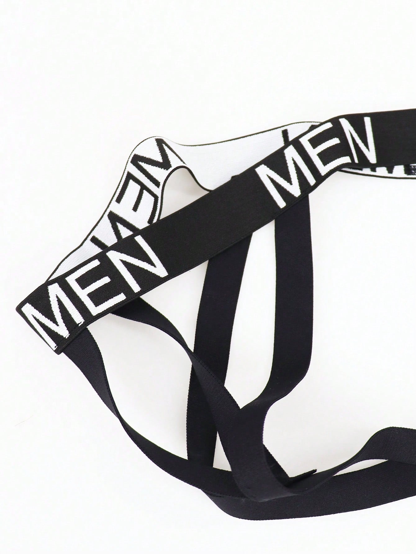 Men's low rise mesh jockstrap underwear with letter pattern, medium stretch fabric, made from 92% polyamide and 8% elastane.