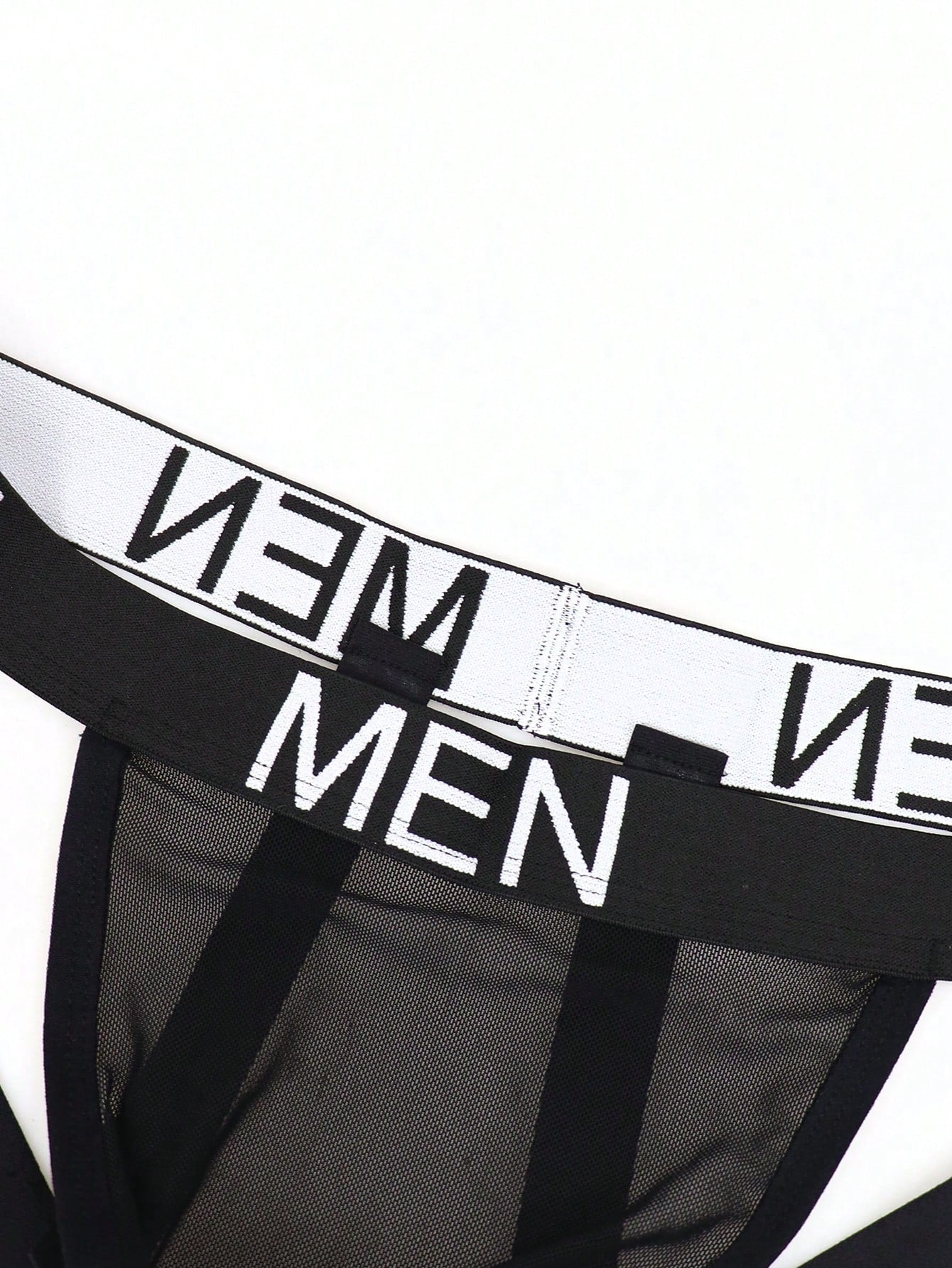 Men's low rise mesh jockstrap underwear with letter pattern, medium stretch fabric, made from 92% polyamide and 8% elastane.