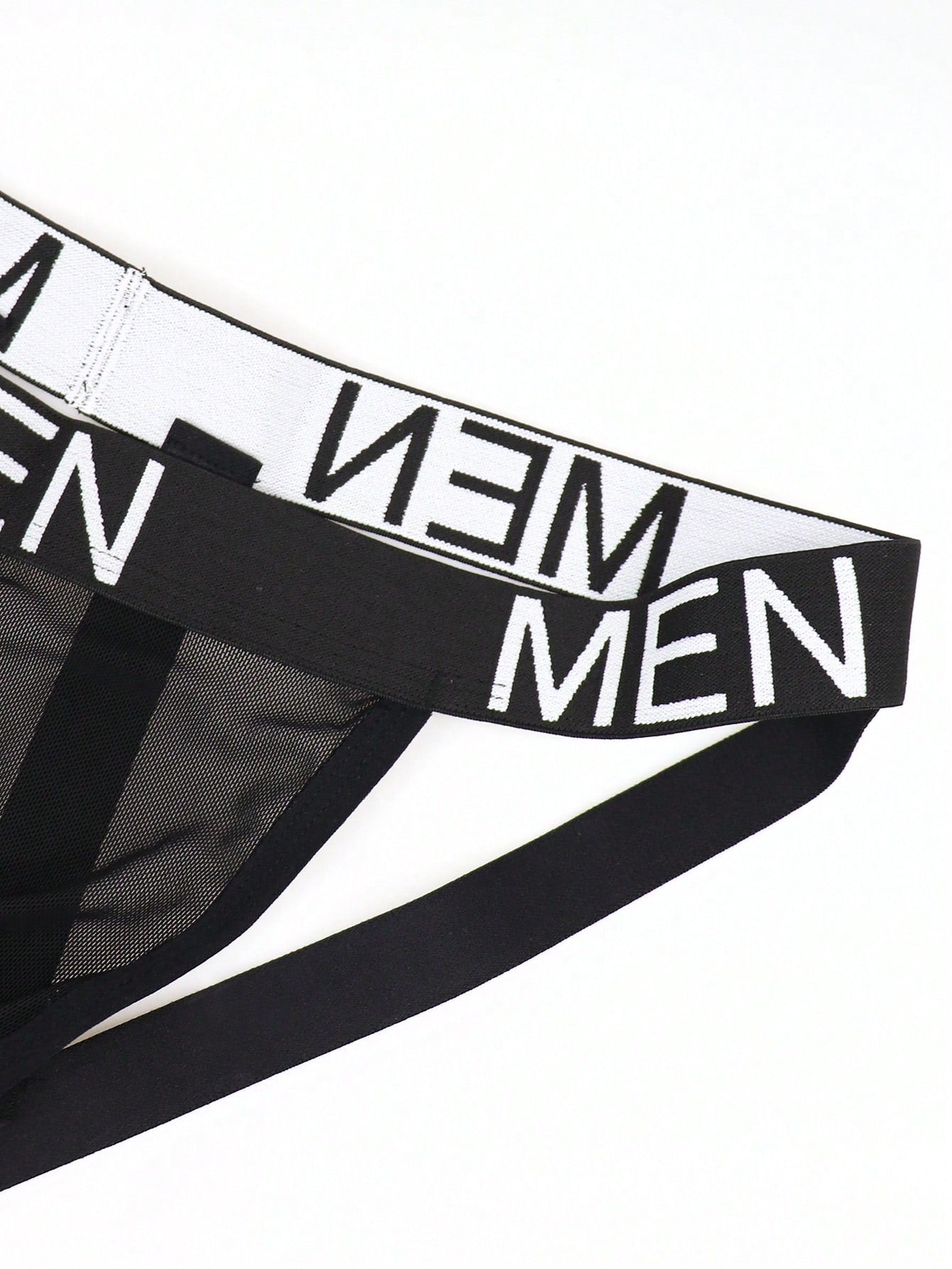 Men's low rise mesh jockstrap underwear with letter pattern, medium stretch fabric, made from 92% polyamide and 8% elastane.