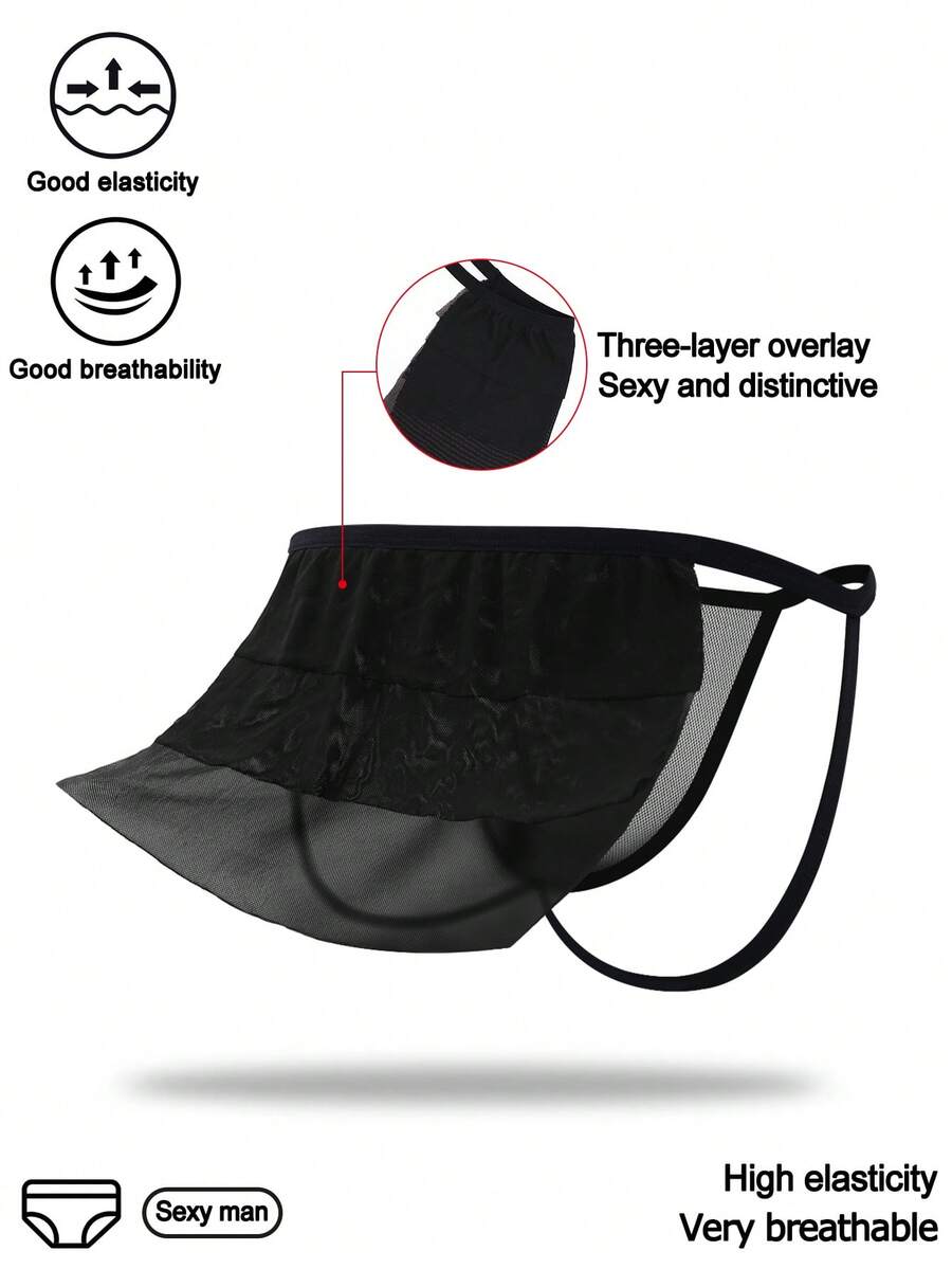 Men's black mesh jockstrap underwear featuring sheer hollow design and low rise fit.