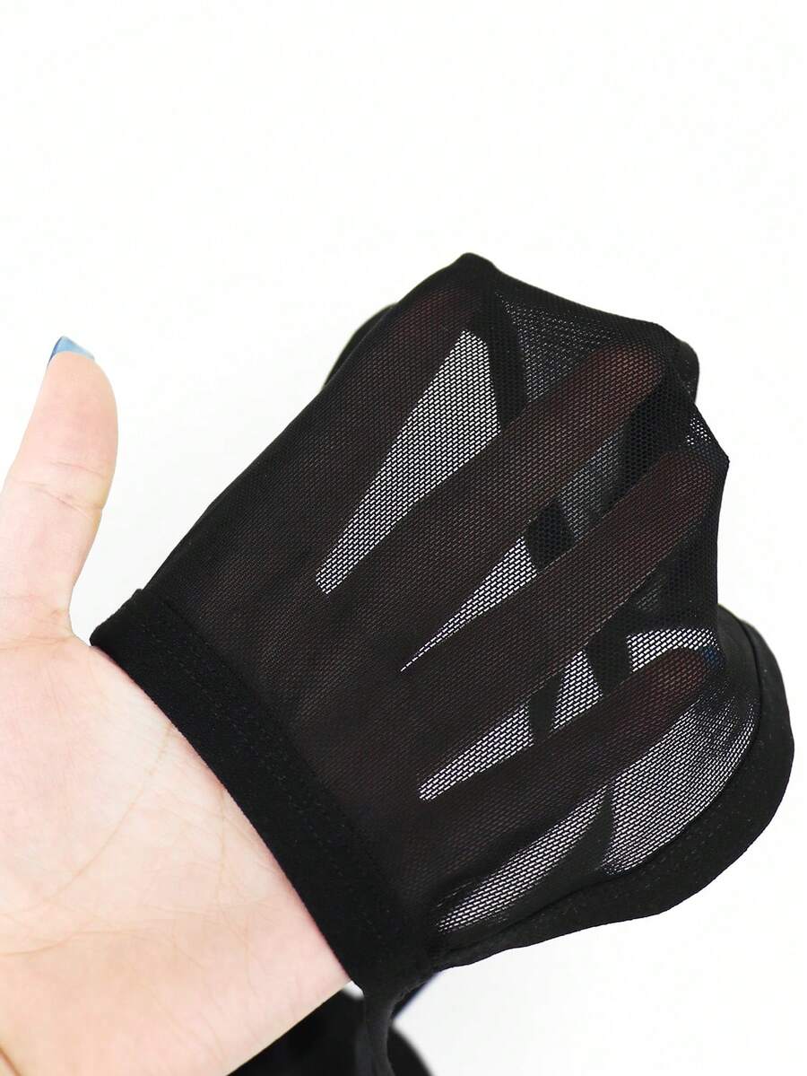 Men's black mesh jockstrap underwear featuring sheer hollow design and low rise fit.
