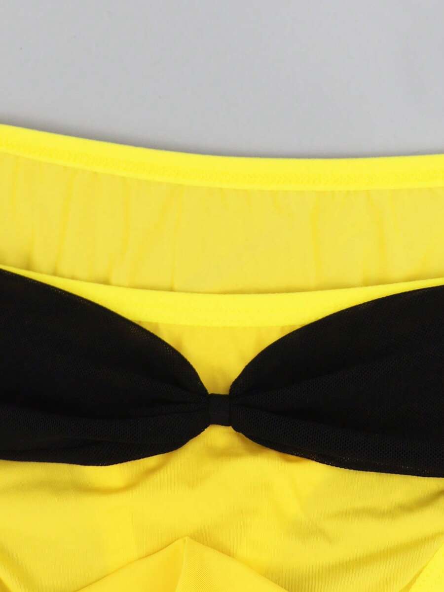 Men's multicolor mid-rise thong underwear featuring contrast mesh details and a colorblock pattern.