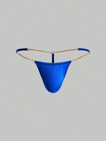Men's low-rise thong underwear with metal chain detail, colorblock design, and high-stretch knitted fabric in a V-string style.