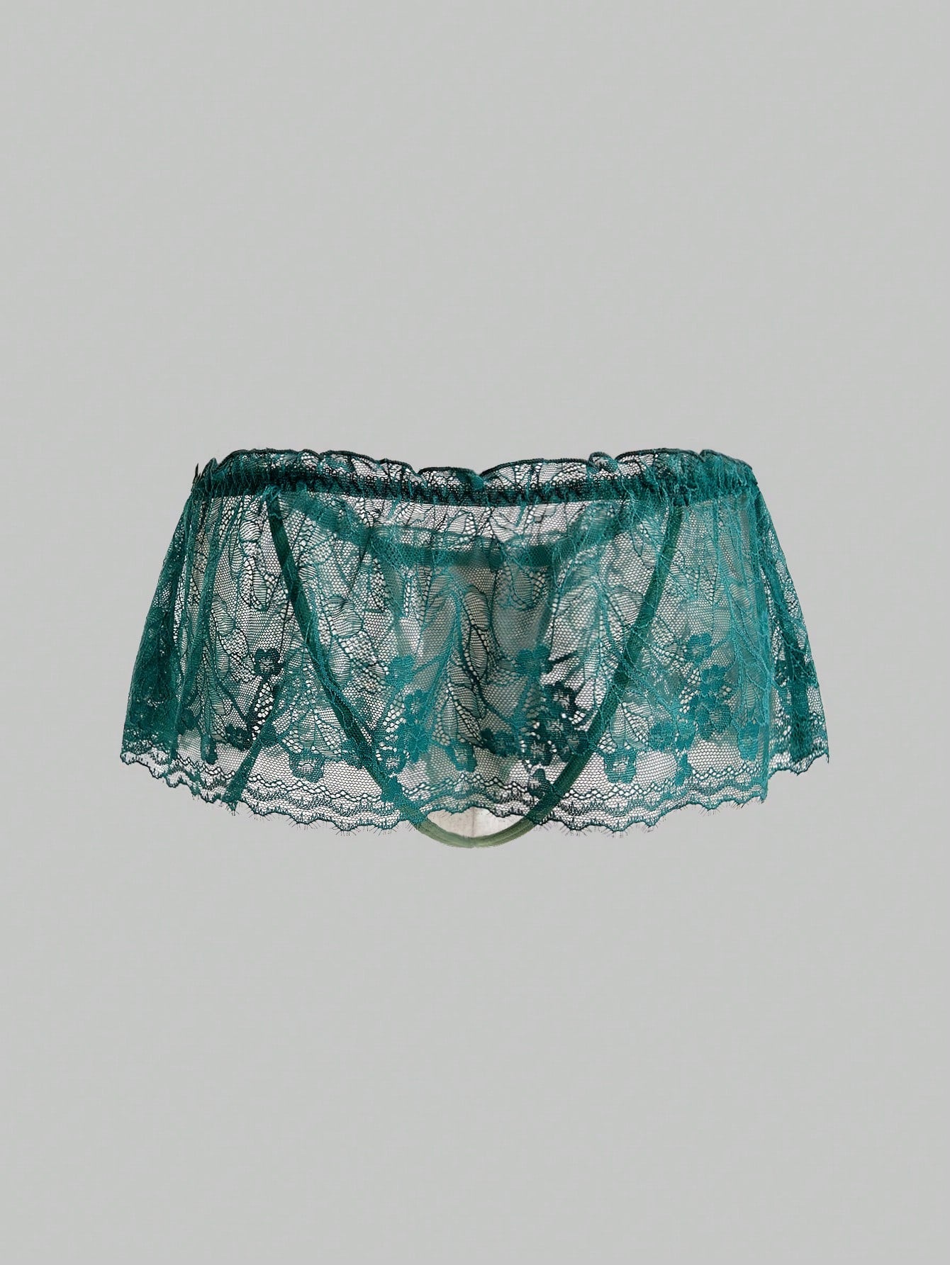 Dark green men's lace thong underwear with semi-sheer contrast lace, low-rise fit, and knitted stretch fabric.
