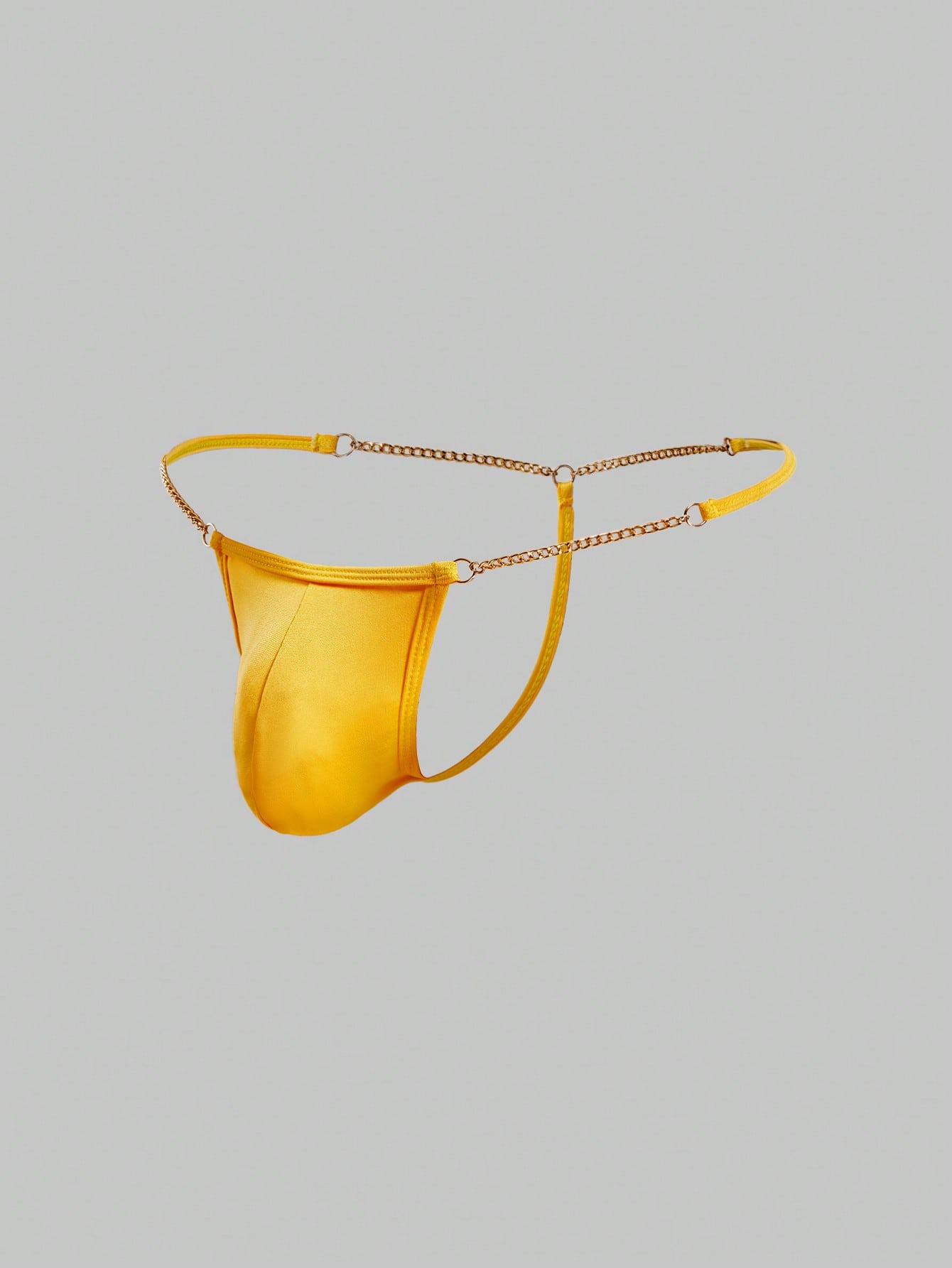 Men's low-rise thong underwear with metal chain detail, colorblock design, and high-stretch knitted fabric in a V-string style.