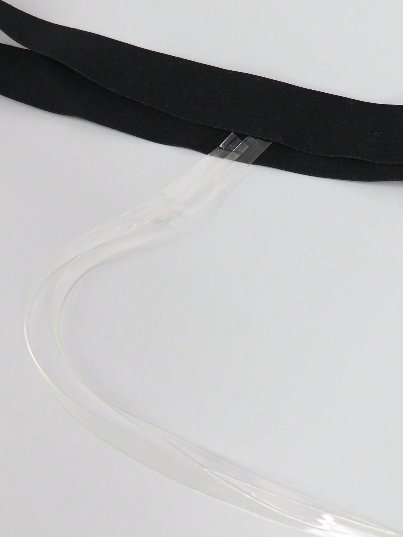 Black men's low rise jockstrap underwear in mesh fabric with colorblock design, medium stretch, and backless crotchless styling.