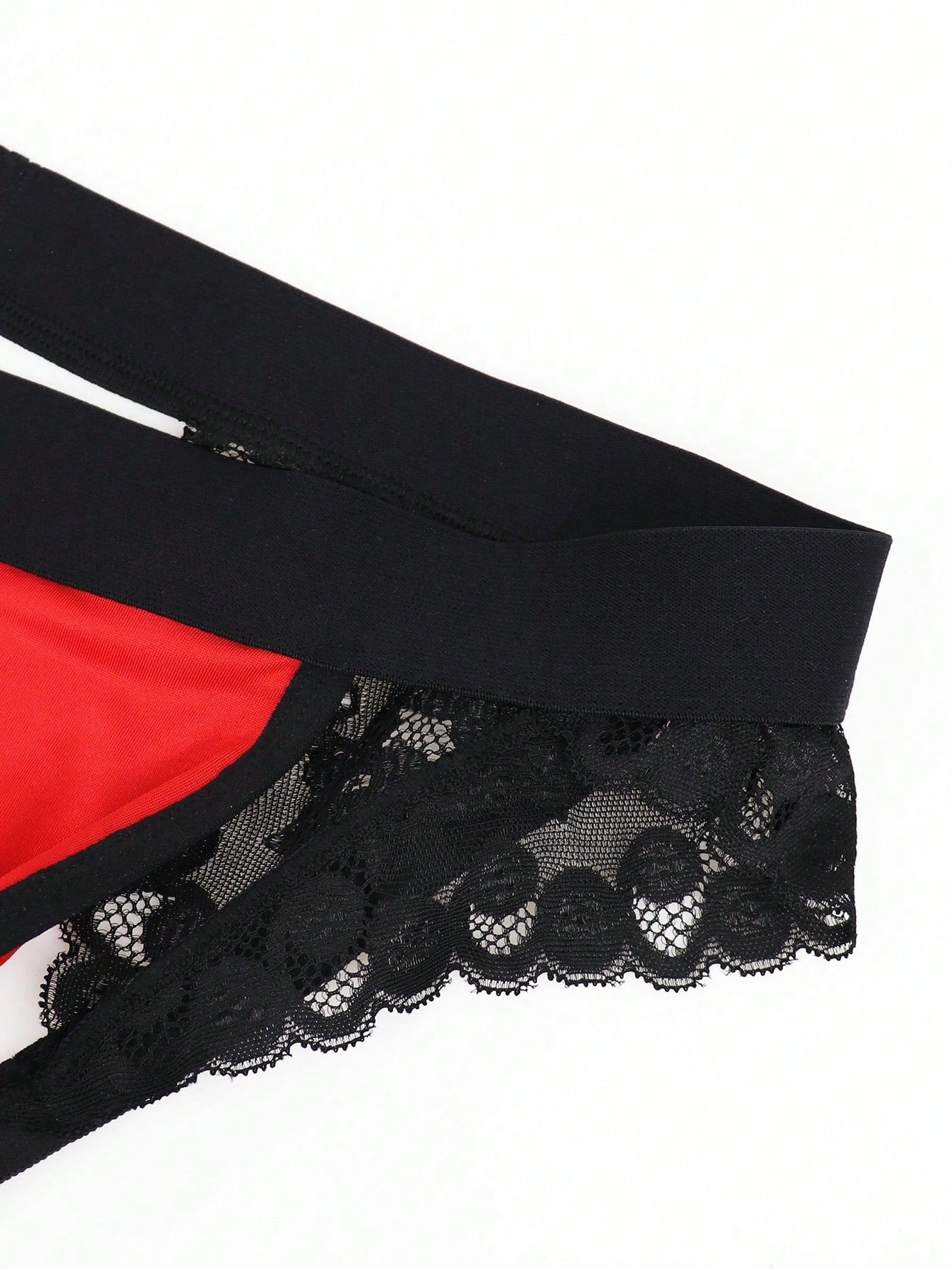 Men's low rise jockstrap underwear with red colorblock design, lace waist, and contrast binding in medium-stretch knitted fabric.