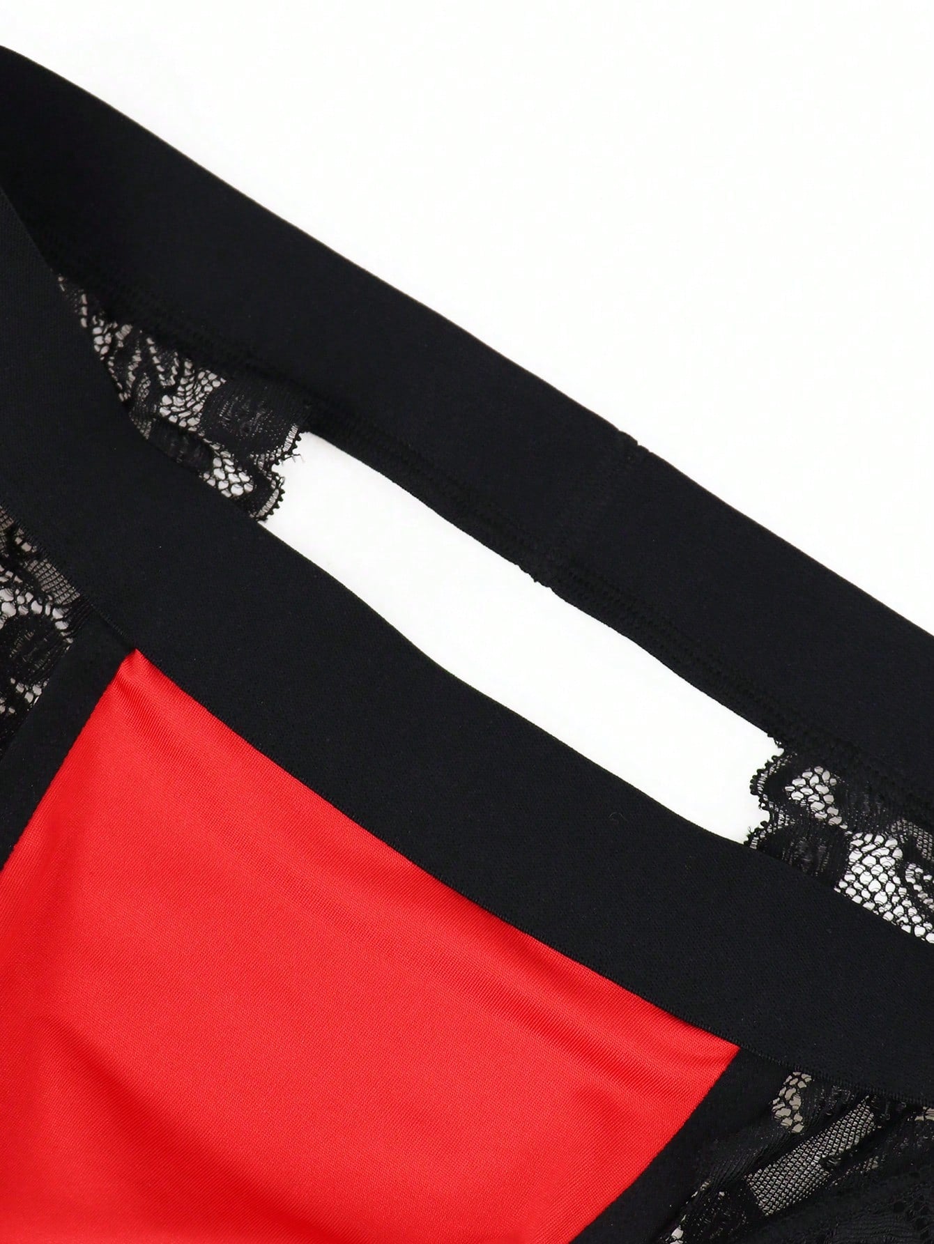 Men's low rise jockstrap underwear with red colorblock design, lace waist, and contrast binding in medium-stretch knitted fabric.