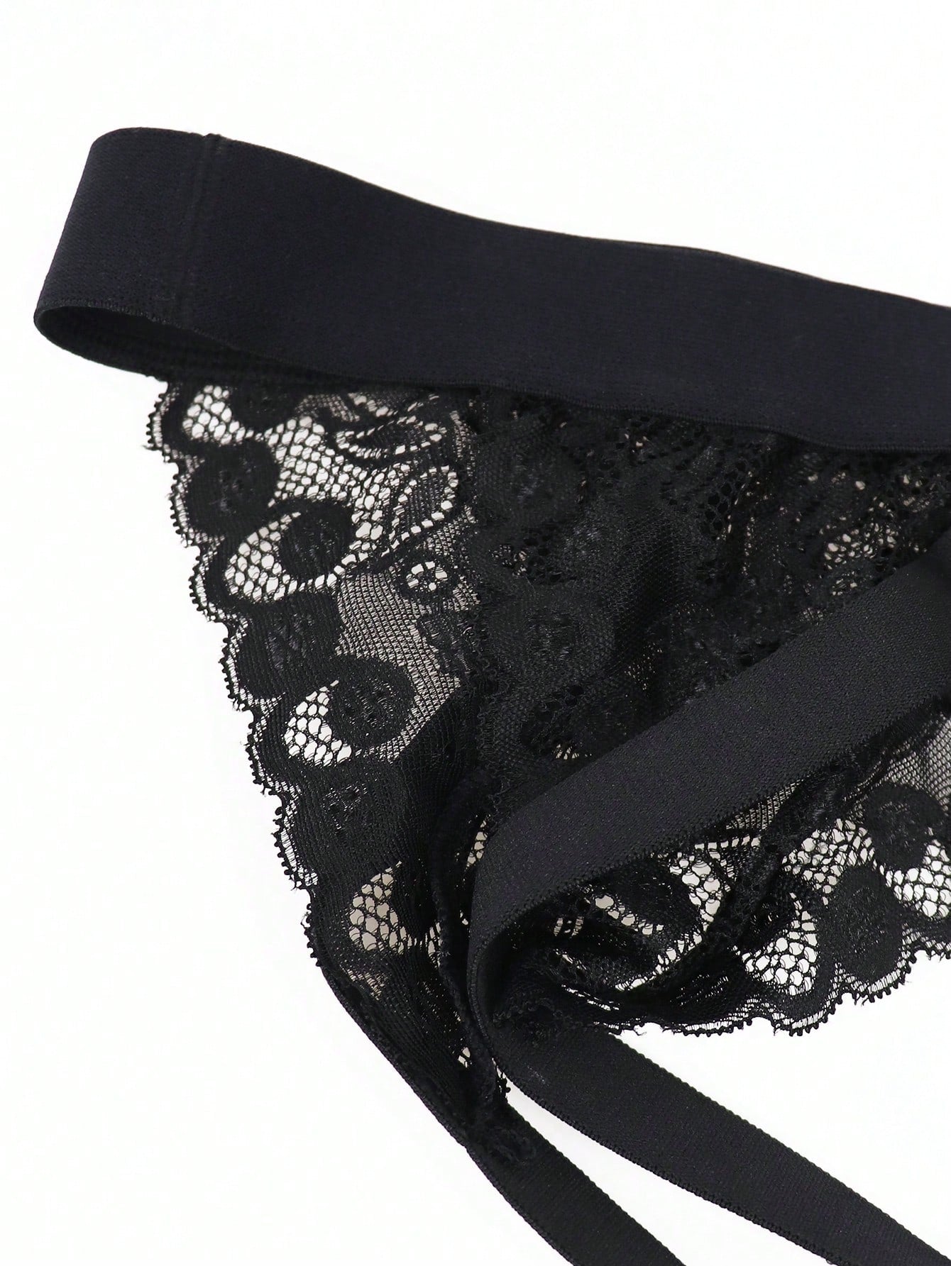 Men's low rise jockstrap underwear with red colorblock design, lace waist, and contrast binding in medium-stretch knitted fabric.