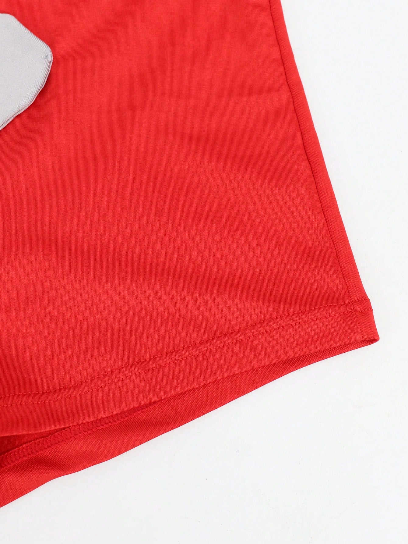 Men's mid-rise boxer shorts in red knitted fabric with medium stretch, featuring animal and cartoon pattern details.