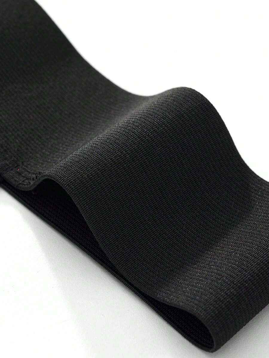 Black low rise men's jockstrap underwear featuring a letter print wide waistband
