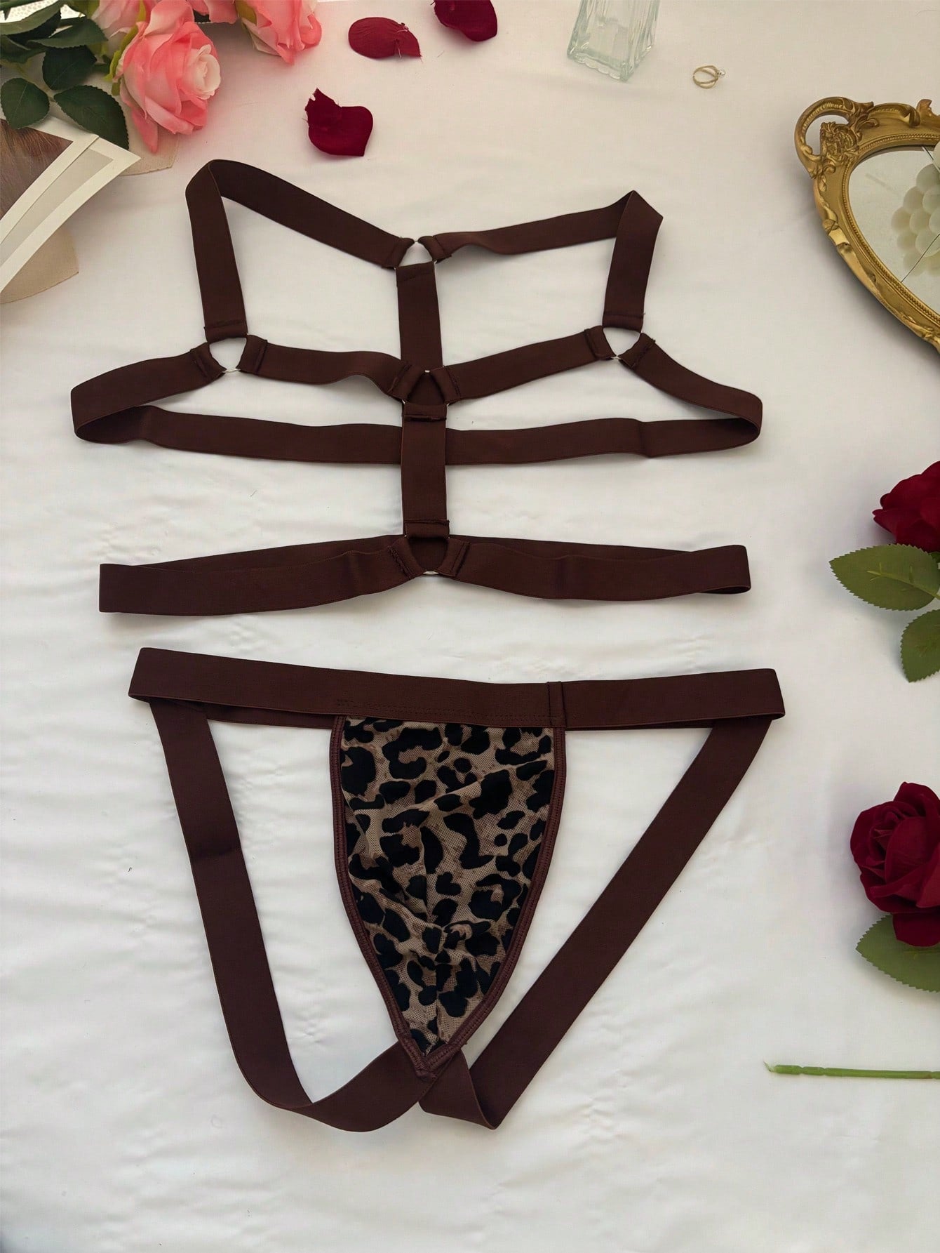 Men's sexy lingerie 3-piece set in leopard print mesh with matching leopard print straps, short vest top, and low rise thong styling for rave, festival, or Halloween wear.