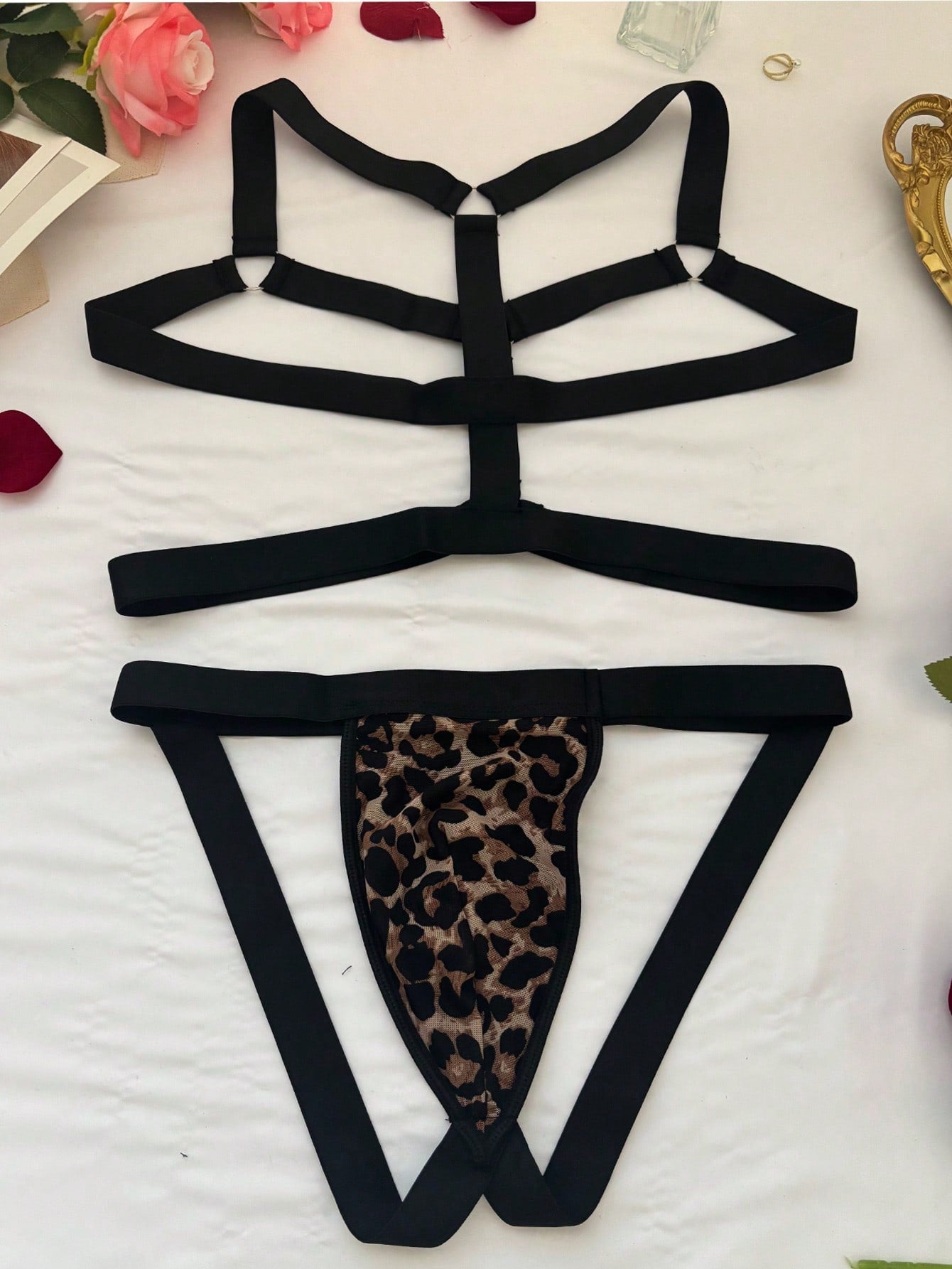 Men's sexy lingerie 3-piece set in leopard print mesh with matching leopard print straps, short vest top, and low rise thong styling for rave, festival, or Halloween wear.