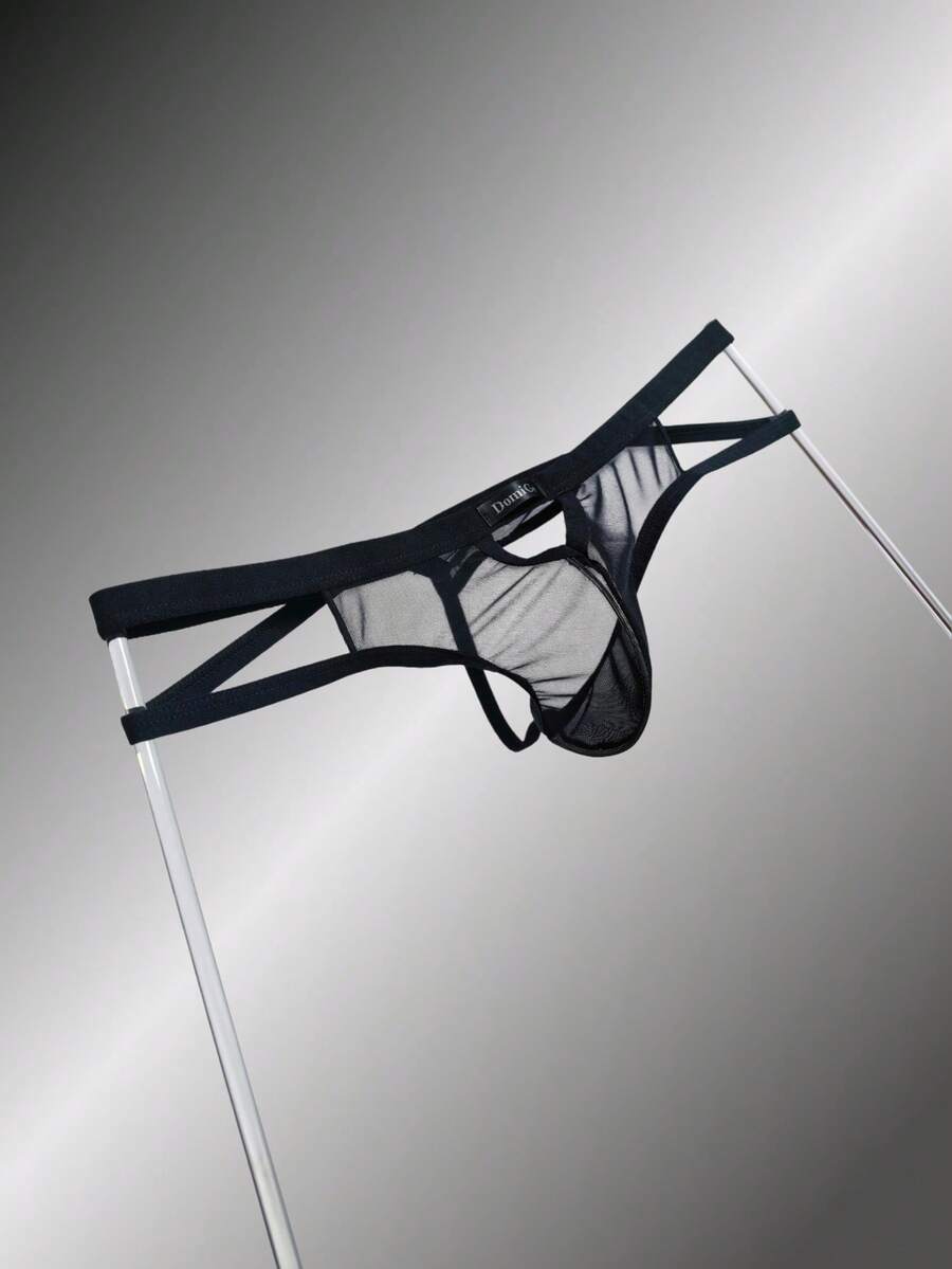 Men's black mesh G-string thong underwear featuring a low-waist cut-out front design.