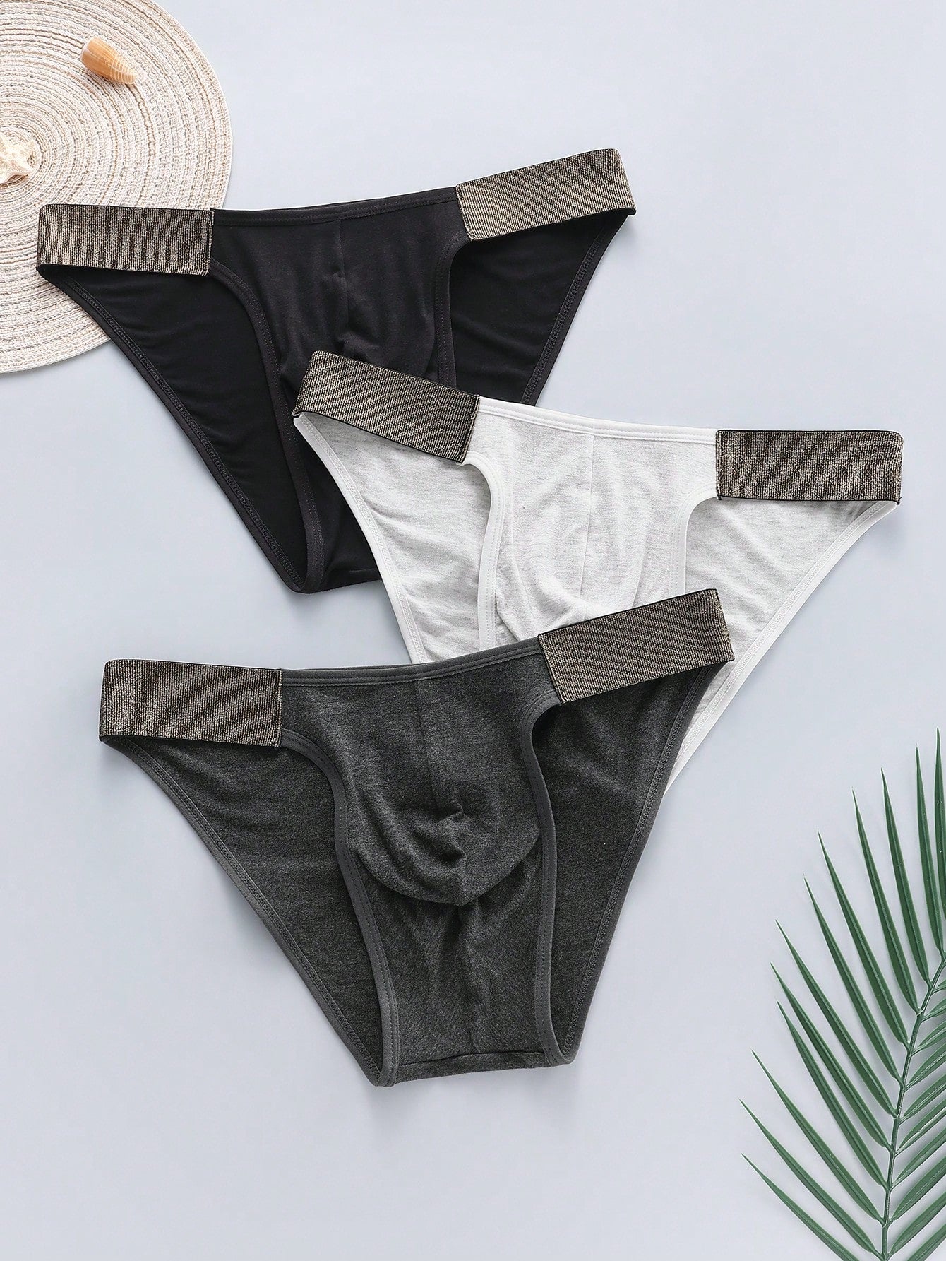 3-pack of men's plain low-rise briefs with contrast waistband, made from viscose blend knitted fabric with medium stretch