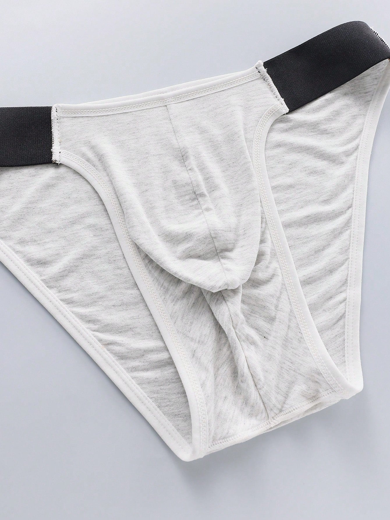 3-pack of men's plain low-rise briefs with contrast waistband, made from viscose blend knitted fabric with medium stretch