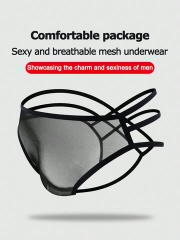 Black men's criss-cross mesh thong underwear with low rise V-string design and medium stretch fabric.