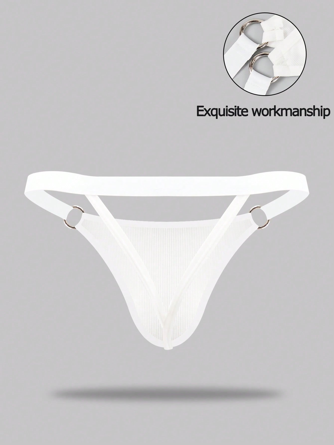Men's black low rise thong briefs with cut out detail, plain pattern, and medium stretch knitted fabric