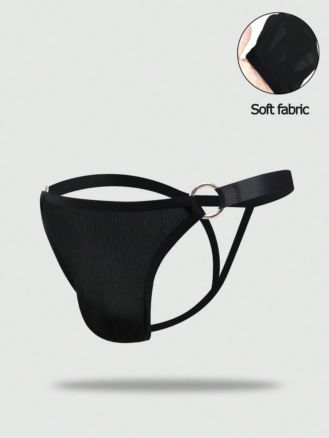 Men's black low rise thong briefs with cut out detail, plain pattern, and medium stretch knitted fabric