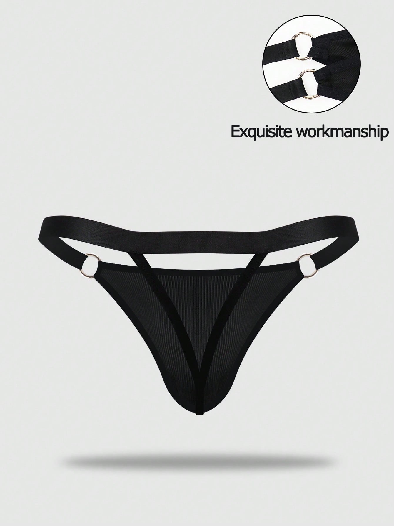 Men's black low rise thong briefs with cut out detail, plain pattern, and medium stretch knitted fabric