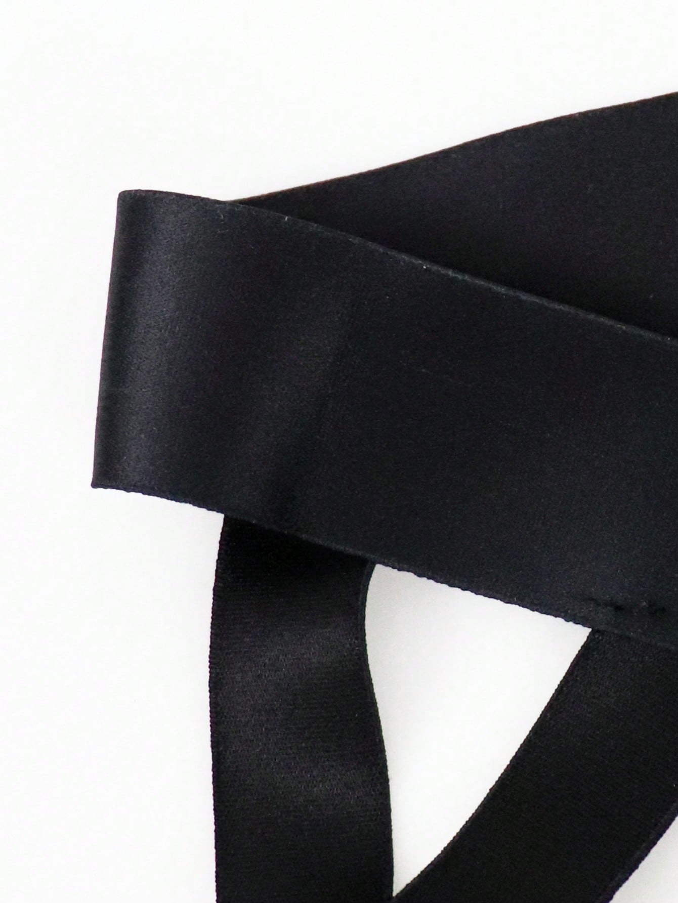 Men's solid color jockstrap underwear in knitted fabric with a breathable hollow design, low rise fit, plain pattern, and medium stretch for daily wear.