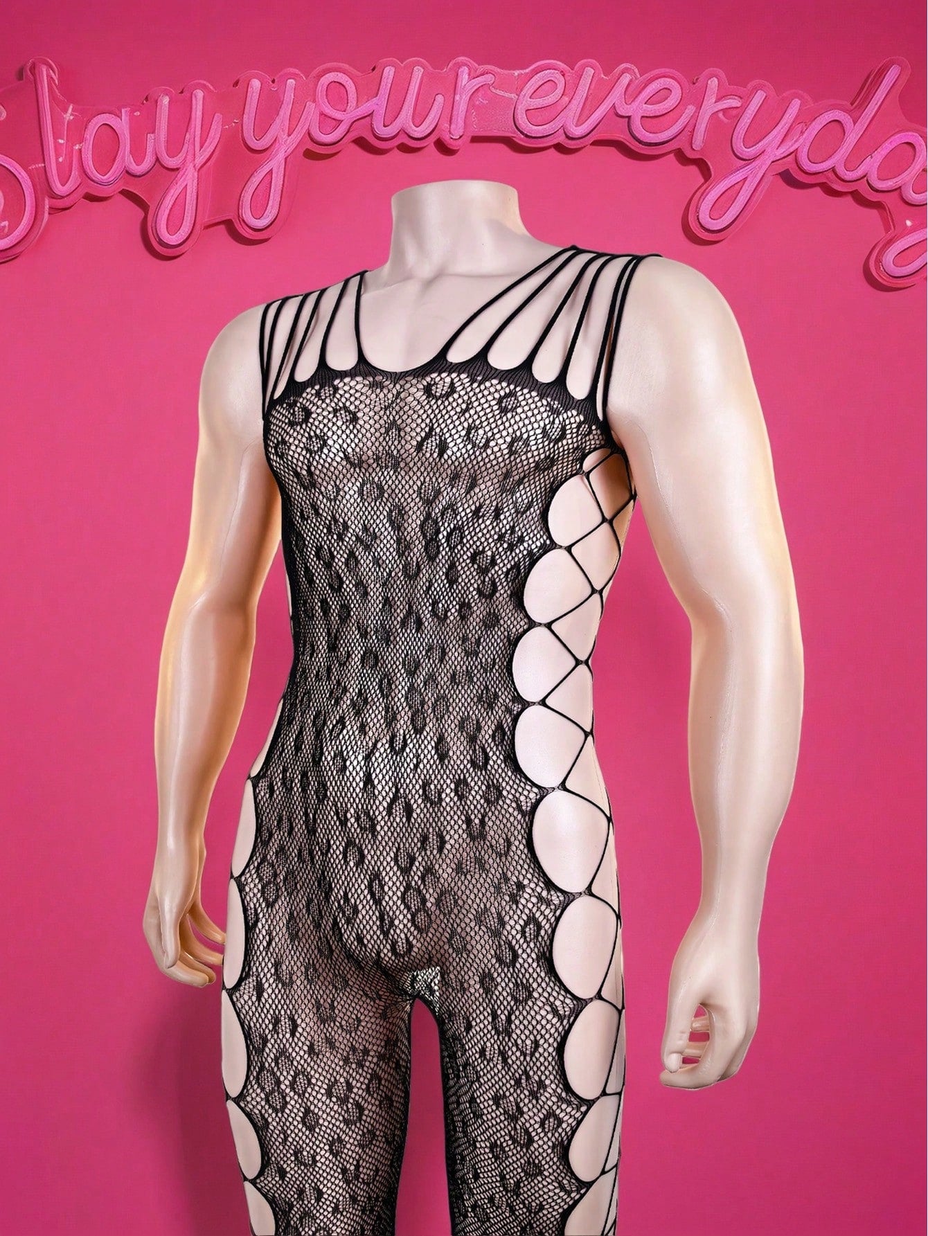 Black men's bodysuit with sheer cut-out design, short length, mid rise, and high-stretch polyamide elastane fabric for party, festival, and costume wear.