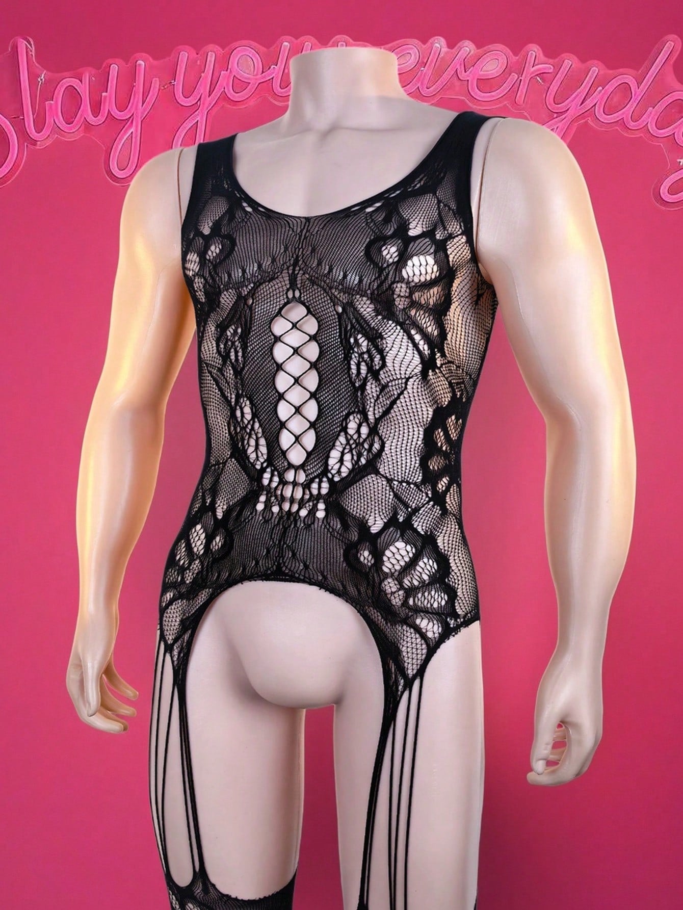 Black men's sheer bodysuit with cut-out design, scoop neck, mid-rise fit, and high-stretch polyamide elastane fabric.