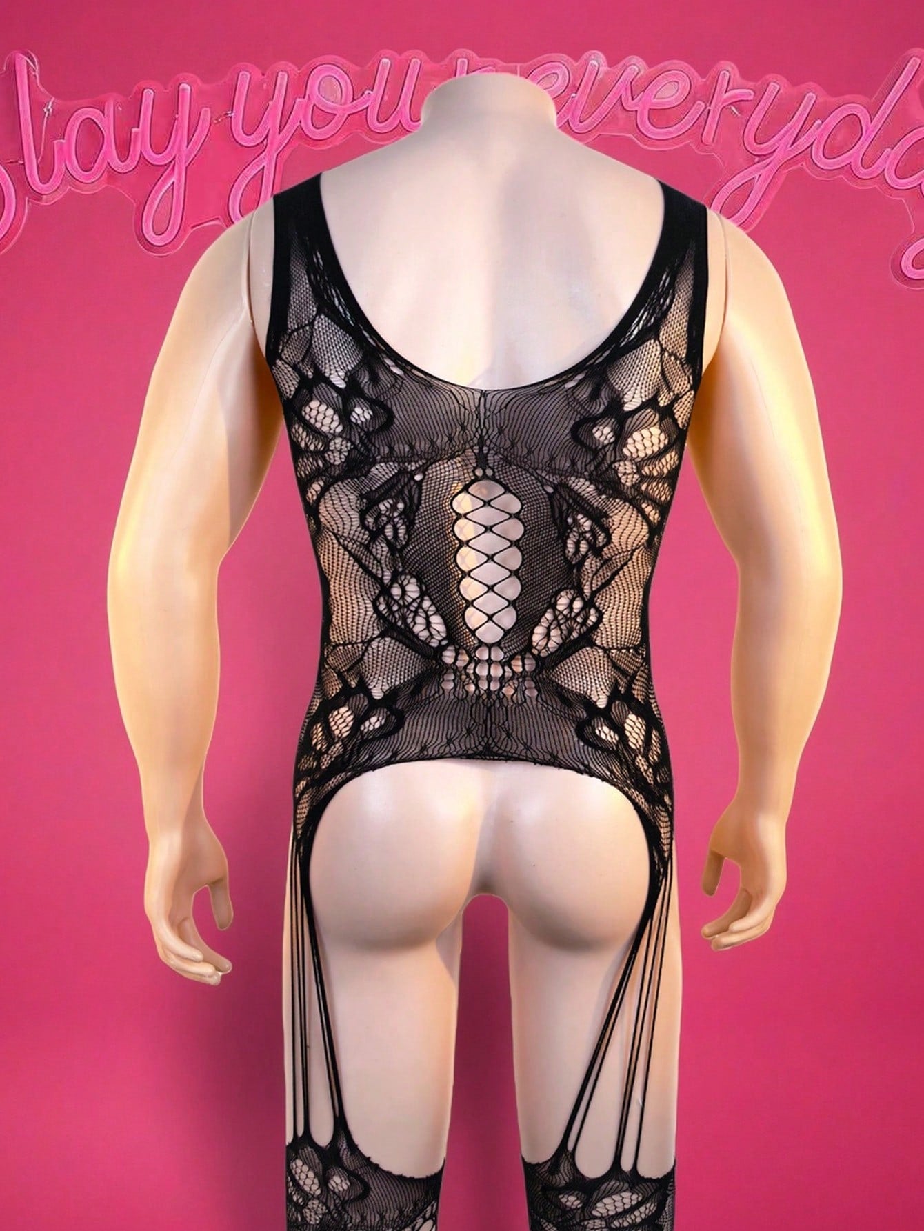 Black men's sheer bodysuit with cut-out design, scoop neck, mid-rise fit, and high-stretch polyamide elastane fabric.