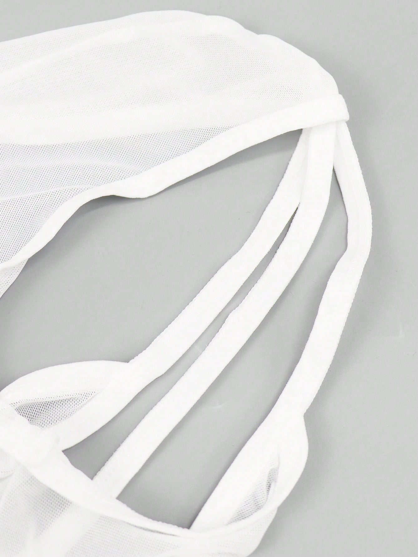 Men's white mesh thong underwear with a sleeveless deep V-neck design, plain pattern, cut out detail, and mid-rise fit.