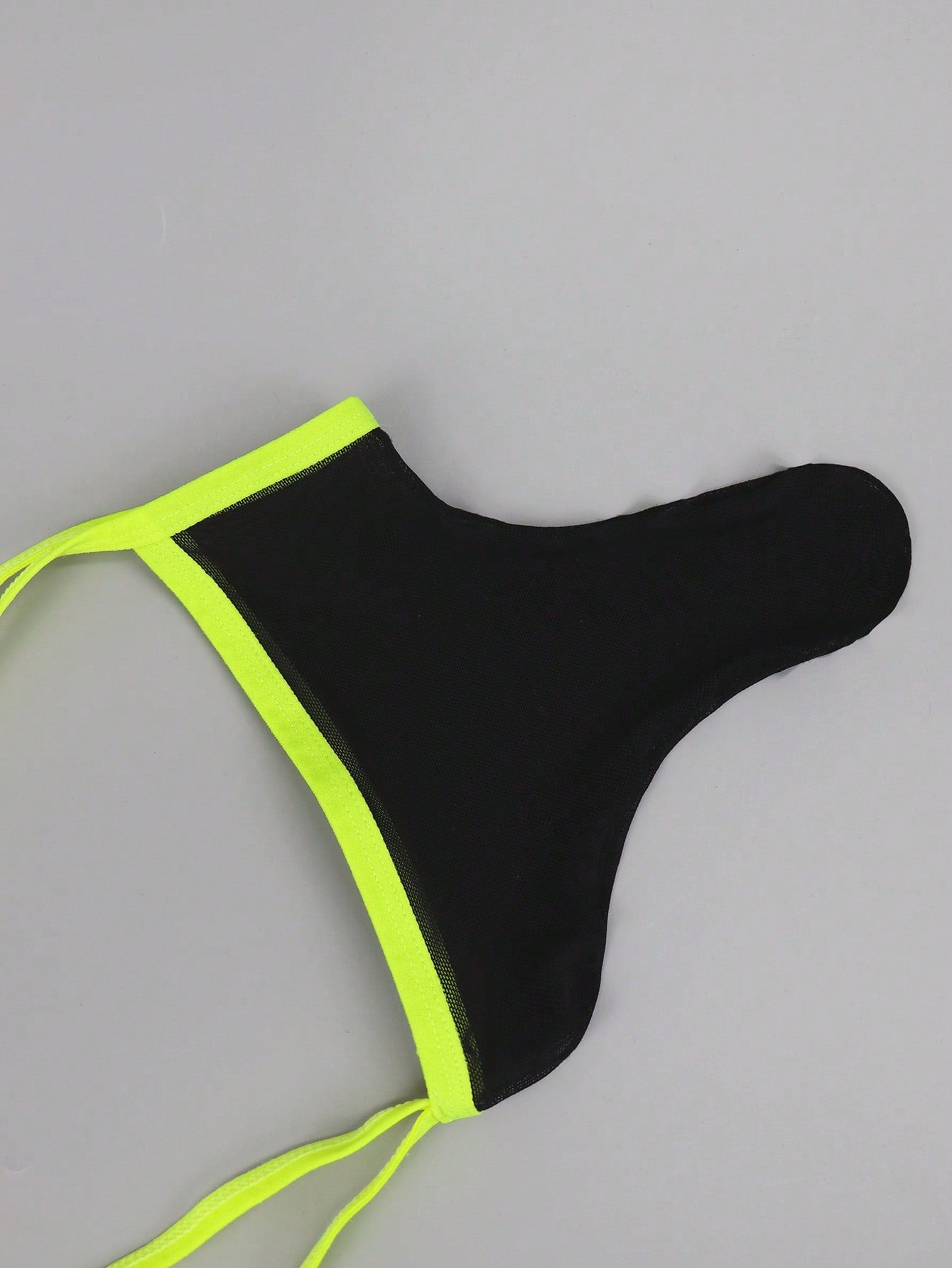 Men's black mesh jockstrap underwear with a plain design, U-convex pouch, and mid-rise fit.