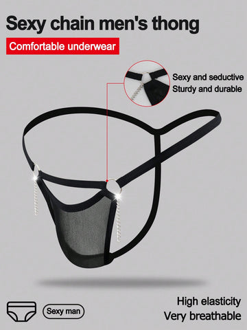 Men's black low rise mesh thong underwear with chain detail and colorblock design.