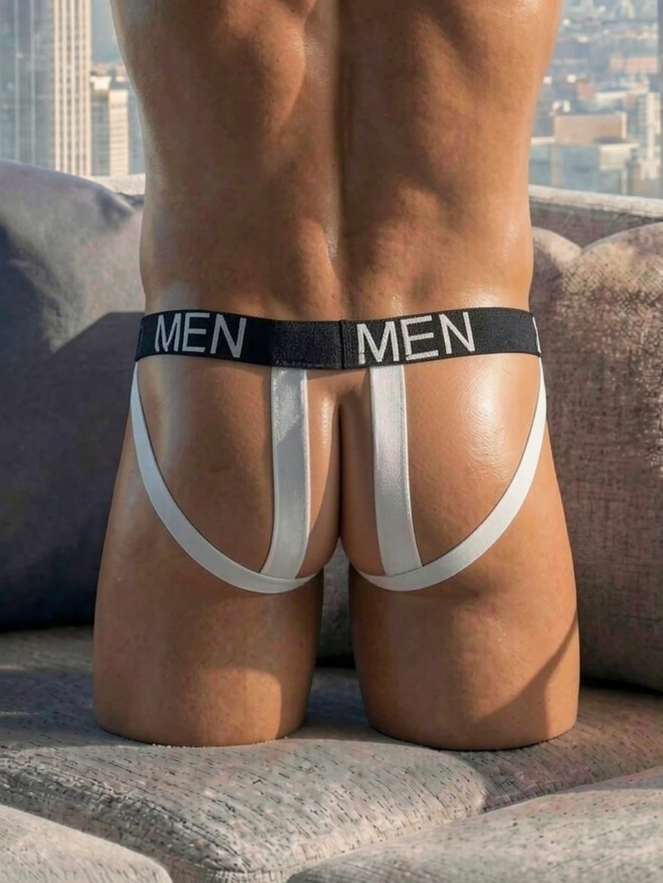 Men's low rise mesh jockstrap underwear with letter pattern, medium stretch fabric, made from 92% polyamide and 8% elastane.