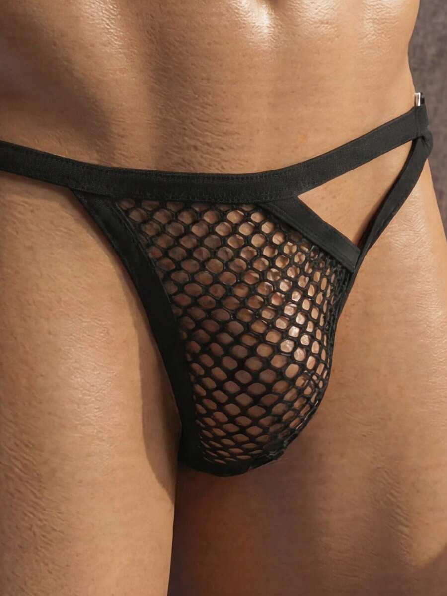 Plain black low-rise men's thong underwear with a front ring detail made of knitted polyester fabric.