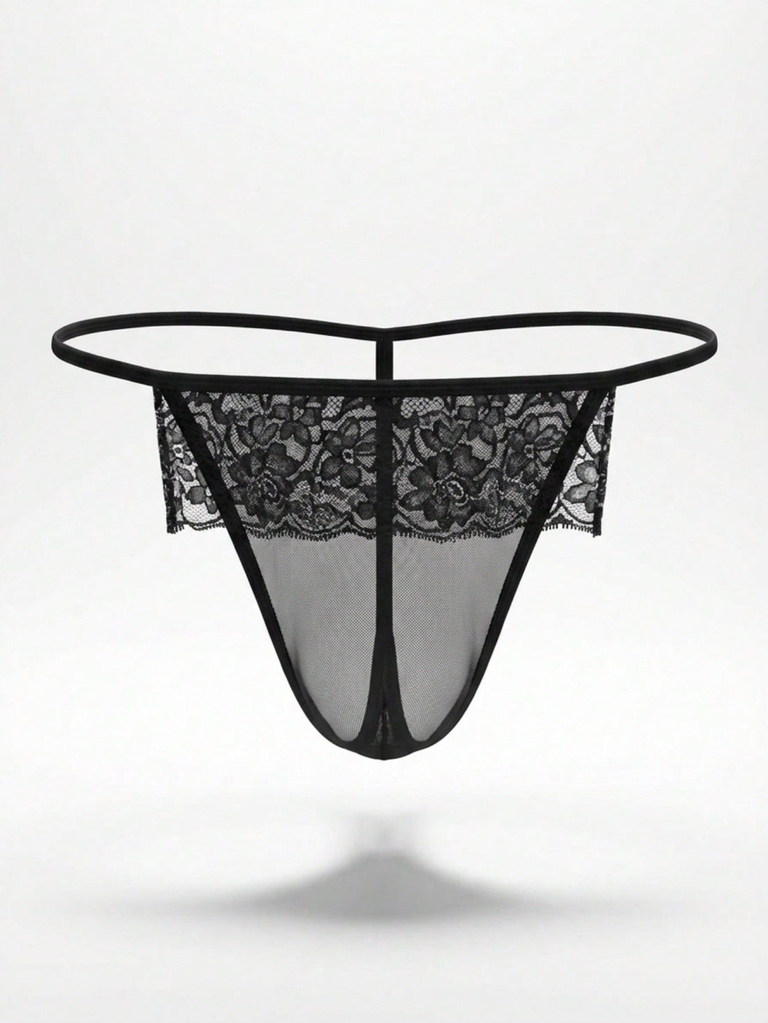 Men's black low-rise thong underwear in mesh fabric with contrast lace waistband and slim-fit design.