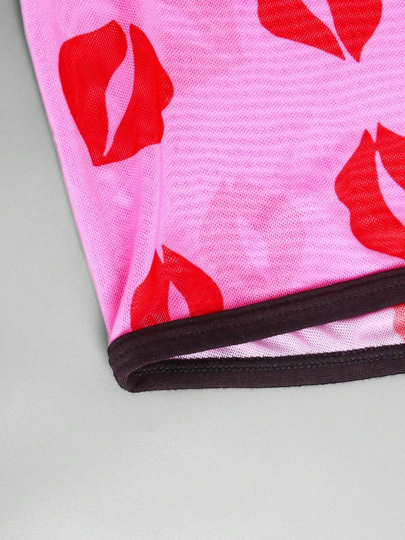 Red sheer men's mesh boxer shorts with tape detail, mid-rise waist, and slight stretch knitted fabric.
