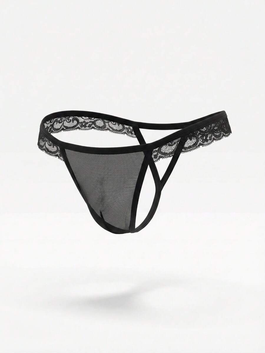 Black low rise men's thong with lace splice design and breathable mesh fabric.